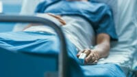 An immigrant with health insurance at the hospital