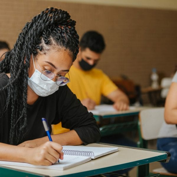 An immigrant studies for the citizenship test.
